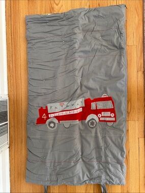 Pottery Barn Kids gray sleeping bag with fire truck for preschoolers